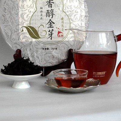 厂家直销批发云南普洱茶熟茶香醇金芽普洱357g茶饼勐海味图5