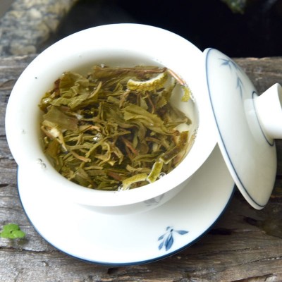 陈皮普洱茶云南普洱小茶饼新会陈皮丝配普洱生茶小圆饼茶叶批发